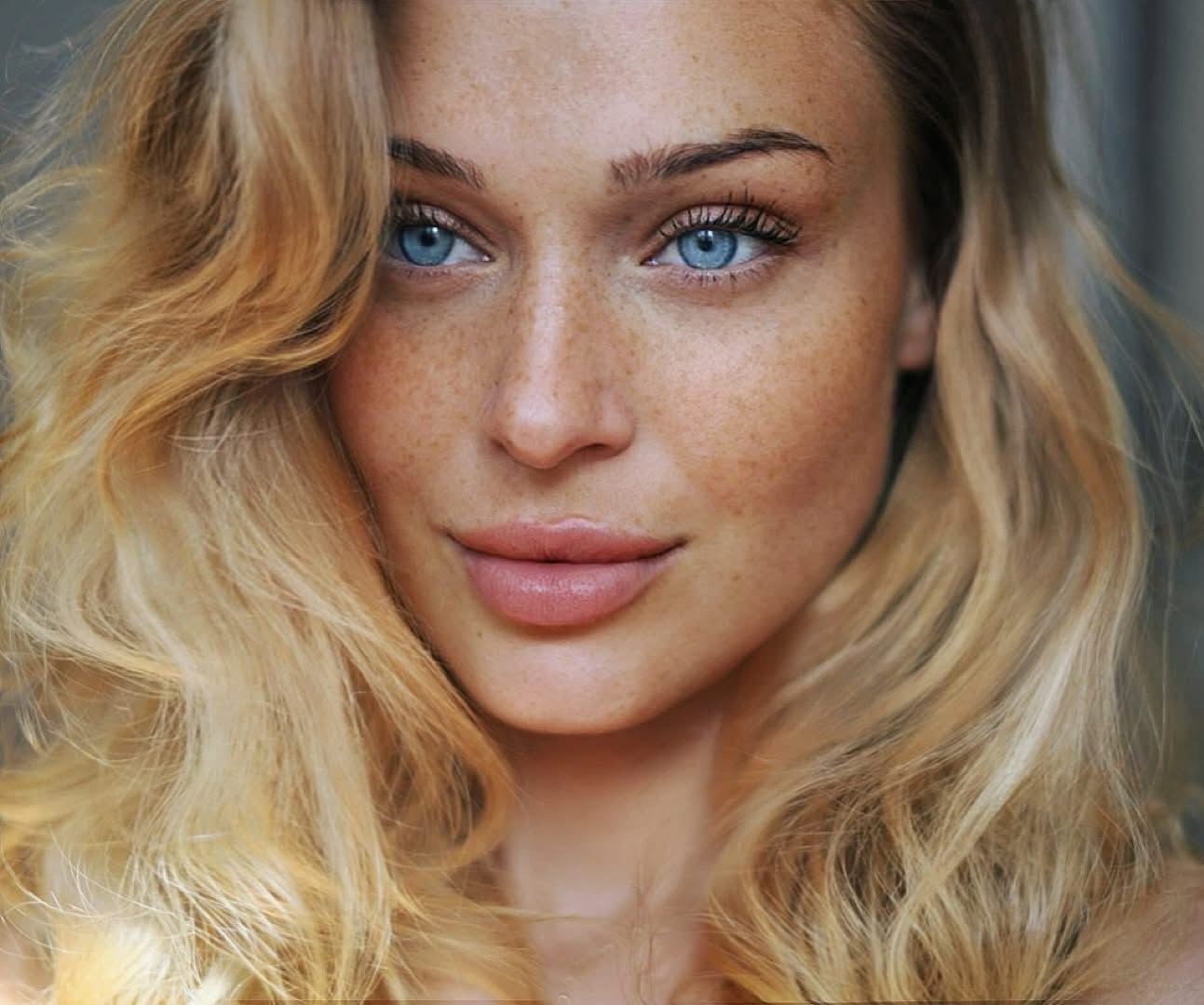 Close-up beauty portrait highlighting blue eyes